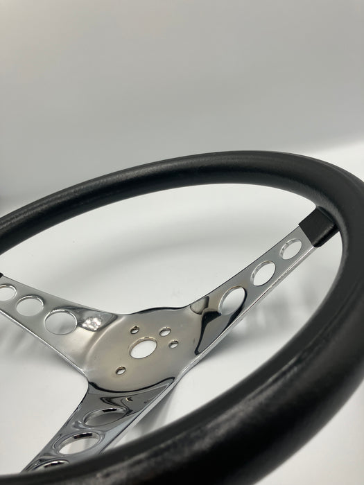 Ratt svart, skummad plast, 3 hålade ekrar, 12 1/2"